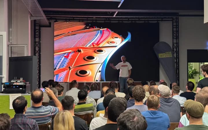 Matthias Lübken presenting at AI Tinkerers Cologne at REWE digital