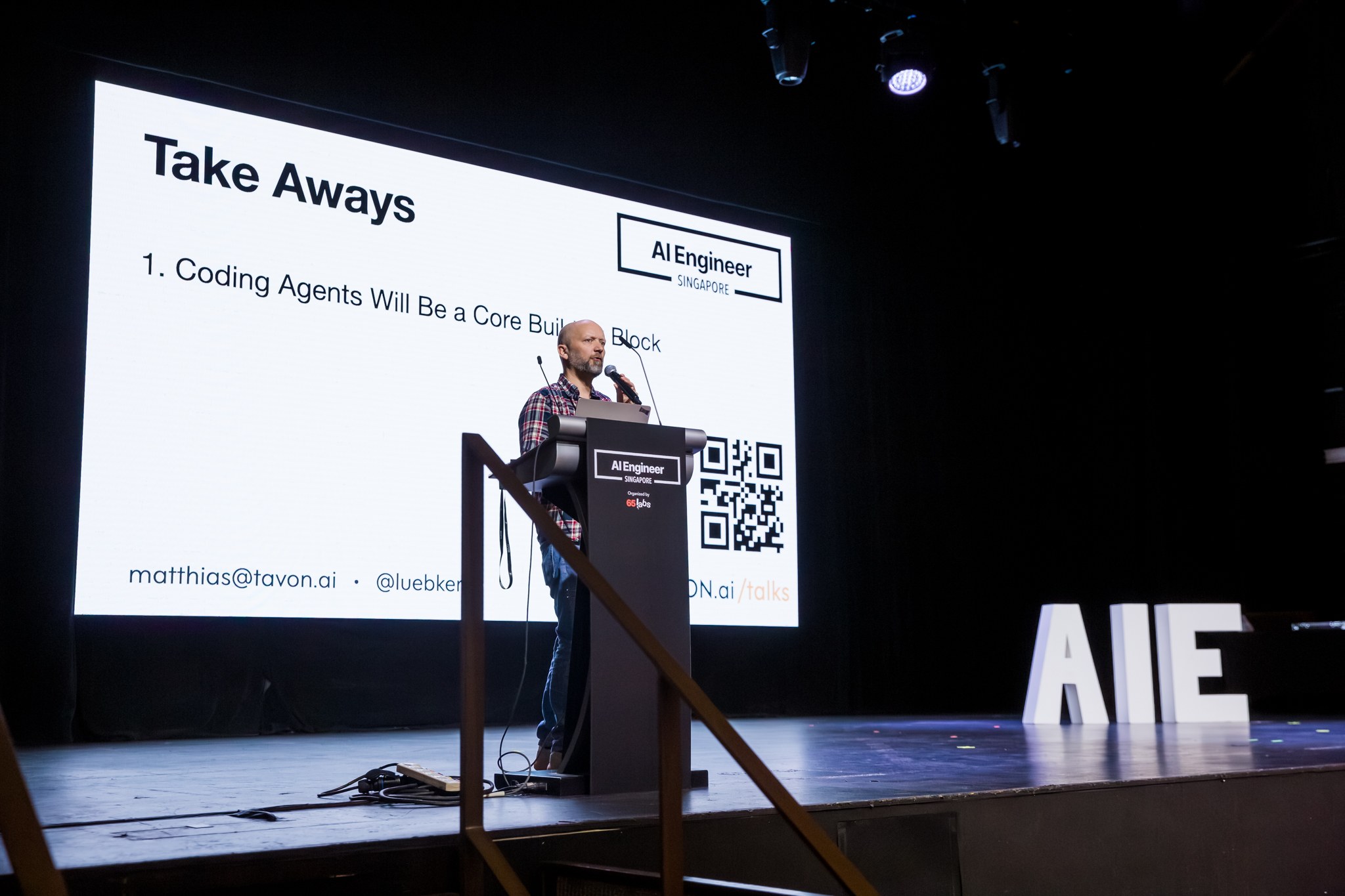 Matthias Lübken speaking at AI Engineer Singapore